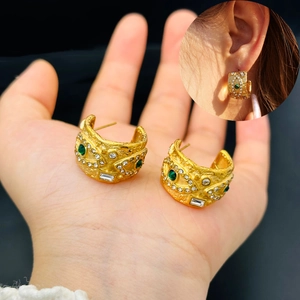 Vintage gold-plated C-shaped earrings with malachite, sparkling zircons and hammered texture
