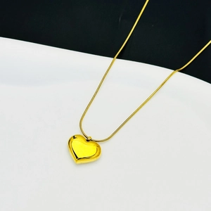 Polished 18k gold heart pendant necklace on a minimalist snake chain for women