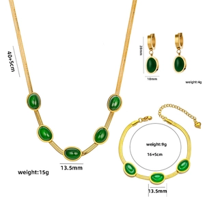Parure vintage en acier titane et émeraude avec collier boucles d'oreilles et bracelet
