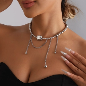 Silver layered geometric cylinder bead necklace with tassel chains for women