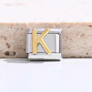 Close-up of gold letter K link for customizable Italian charm bracelet stainless steel jewelry