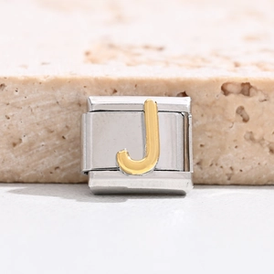 Detail of DIY Italian charm link in stainless steel with golden letter J engraving