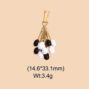 Detail of stainless steel heart pendant with black and white beads and size measurements