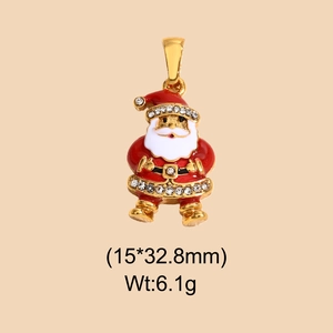 Detail of Santa Claus pendant in gold metal with red enamel and white rhinestones