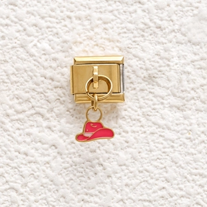 Detail of gold Italian charm link with pink enamel cowboy hat pendant for DIY bracelets
