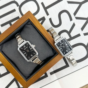 Elegant square women's quartz watch with silver steel band and black Roman numeral dial