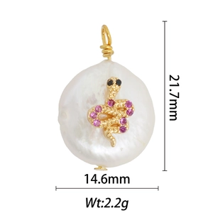 Detail of 18k gold snake pearl pendant with pink zircon inlay and baroque texture