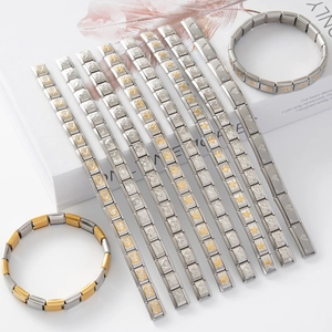 Dettagli di bracciali modulari in acciaio inossidabile con ciondoli a stella e cuore
