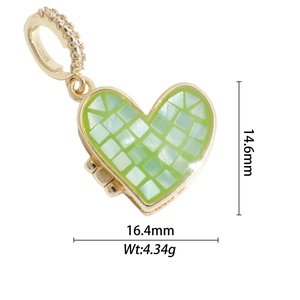 Close-up of gold plated heart locket with green mosaic shell and cubic zirconia bail
