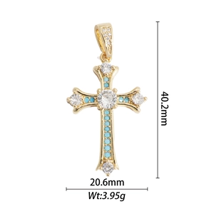 Detailed view of gold plated cross pendant with turquoise beads and size dimensions