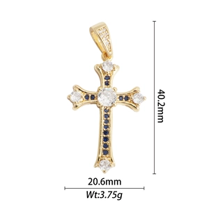 Detail of 18k gold plated cross pendant with blue zircons and clear gems, 40.2mm height