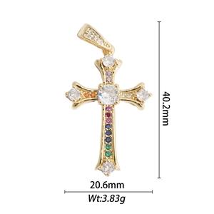 Detail view of 18k gold plated cross pendant with colorful gemstones and size measurements
