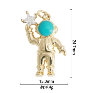 Detail of gold astronaut pendant with blue enamel mask and star-shaped zircon stone