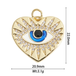 Detailed view of gold plated heart evil eye pendant with zircons and measurements