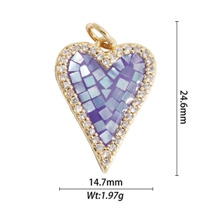 Detail of 18K gold heart pendant with blue mosaic mother of pearl and white zircons