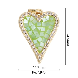 Detail view of 18k gold plated heart cross pendant with size 24.6mm x 14.7mm dimensions