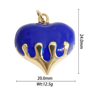 Detail view of 24mm lava heart pendant in gold finish with deep blue enamel