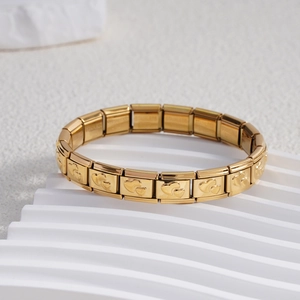 Italian golden stainless steel charm bracelet featuring heart pattern modular links