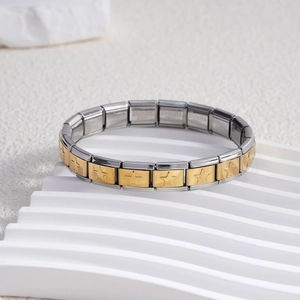 Italian modular charm bracelet with gold star embossed tiles and stainless steel band