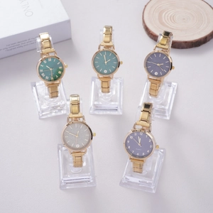 Women's quartz watches with assorted colored dials and gold chain bands set of five