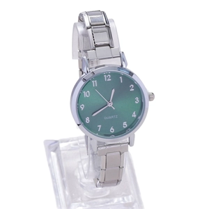 Elegant emerald green quartz watch with elastic rhinestone bracelet and metal case