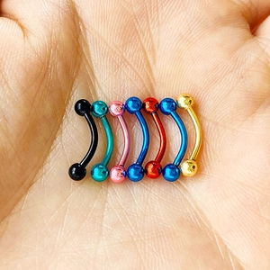 Set of seven colorful stainless steel curved barbell body piercing rings for brows and lips