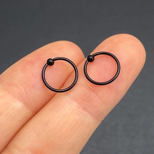 Pair of black stainless steel BCR captive bead rings for nose, ear and eyebrow piercings