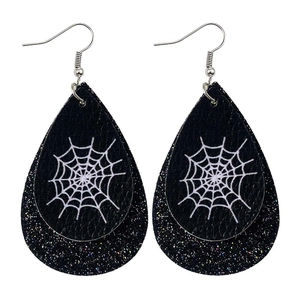 Detail of Halloween drop earrings with white spider web print on black textured leather