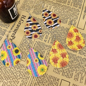 Sunflower teardrop leather earrings set with vintage stripes and floral patterns