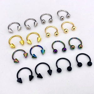 Polished stainless steel circular barbells with ball and spike ends in multi-color sets