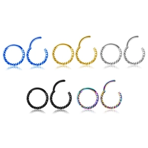 Detailed set of twisted stainless steel clicker rings in five metallic color finishes