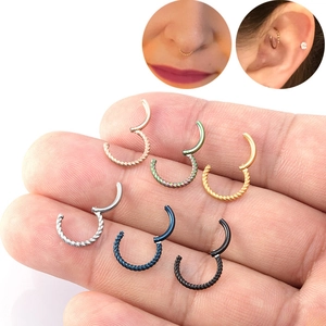 Twisted hinged segment rings set in stainless steel for septum and ear piercings
