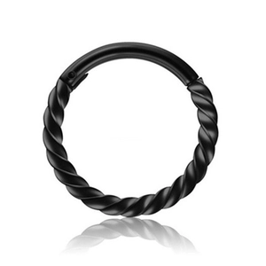Macro shot of black vacuum-plated stainless steel twisted piercing ring with detailed texture