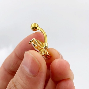 Piercing ombelico a farfalla scintillante in acciaio dorato con zirconi brillanti