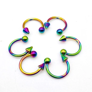 Set of 6 rainbow stainless steel horseshoe rings with ball and cone ends in flower layout