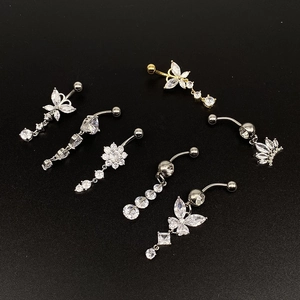 Surgical steel belly button rings set with butterfly and tree of life dangles