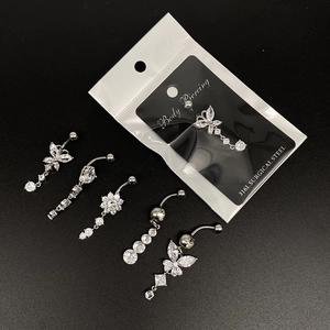 Five butterfly and tree of life belly rings in 316L surgical steel with zircons