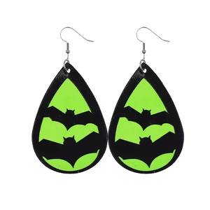 Detailed view of teardrop bat earrings featuring neon green glow and black leather silhouettes