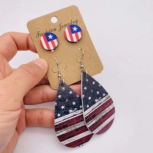 Detail of Independence Day leather earrings set featuring American flag patterns