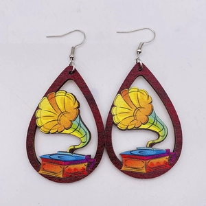 Detail of wooden hollow teardrop earrings featuring a retro colorful gramophone design
