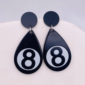 Minimalist acrylic teardrop earrings featuring a classic black 8 billiard ball design