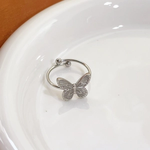 Elegant silver butterfly open ring with adjustable band and polished finish for women