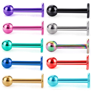Dettaglio di 10 piercing labret multicolore in acciaio inossidabile con base piatta e sfera