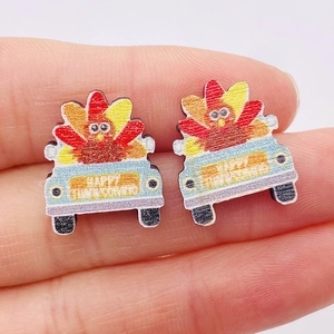 Fall Thanksgiving wooden earrings featuring a turkey in a car with Happy Harvest print