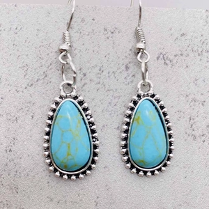 Boucles d'oreilles bohèmes en argent avec pierres turquoise et cadre en métal vintage
