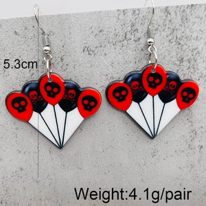 Macro shot of Halloween acrylic bat and skull balloon earrings with 5.3cm length detail