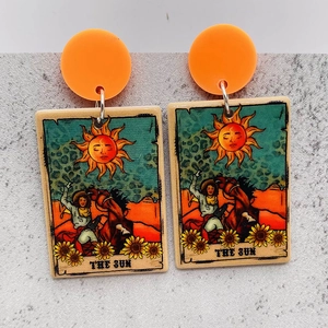 Western cowboy style The Sun tarot card earrings with orange studs and sunflowers