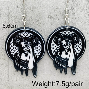 Detail of gothic ram skull acrylic earrings showing 6.6cm length and 7.5g weight measurement
