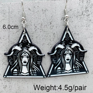 Macro shot of Gothic witch earrings showing 6.0cm height and 4.5g weight details