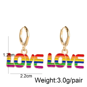 Macro shot of LOVE letter rainbow oil drip earrings with 1.2cm height and 2.2cm width dimensions